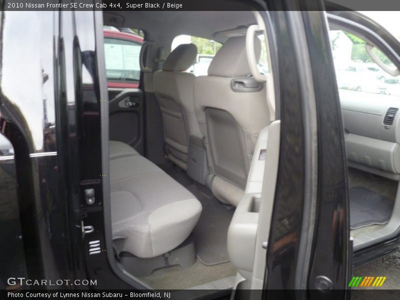 Super Black / Beige 2010 Nissan Frontier SE Crew Cab 4x4