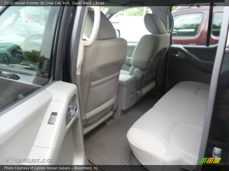 Super Black / Beige 2010 Nissan Frontier SE Crew Cab 4x4