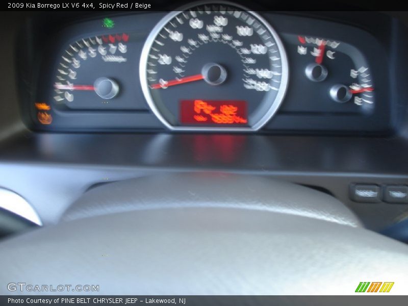 Spicy Red / Beige 2009 Kia Borrego LX V6 4x4