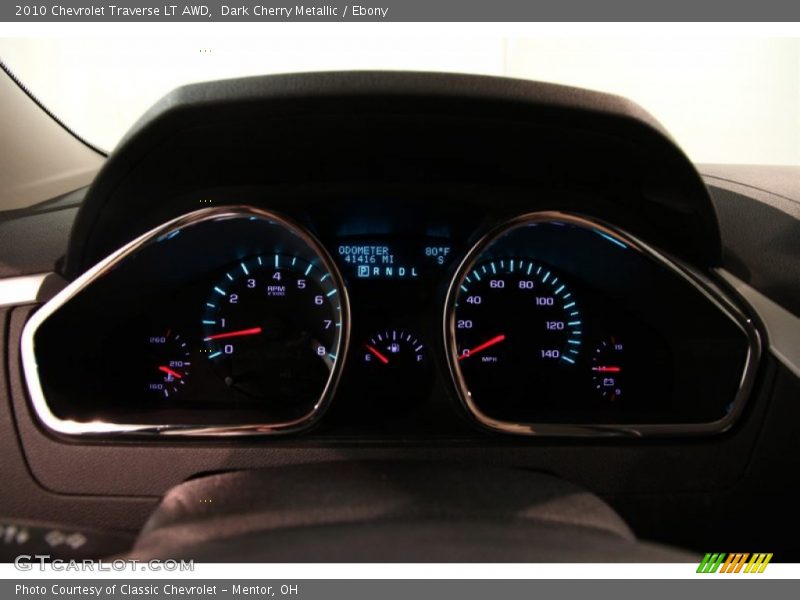 Dark Cherry Metallic / Ebony 2010 Chevrolet Traverse LT AWD