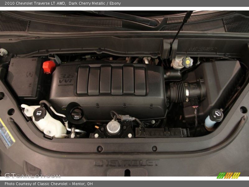 Dark Cherry Metallic / Ebony 2010 Chevrolet Traverse LT AWD