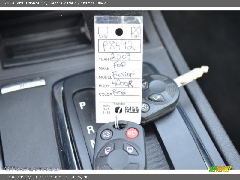 Redfire Metallic / Charcoal Black 2009 Ford Fusion SE V6