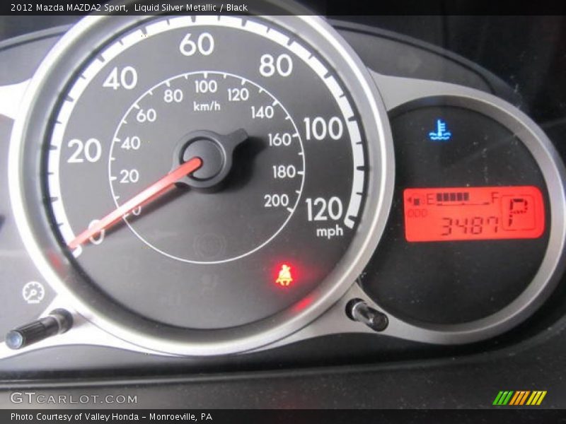 Liquid Silver Metallic / Black 2012 Mazda MAZDA2 Sport
