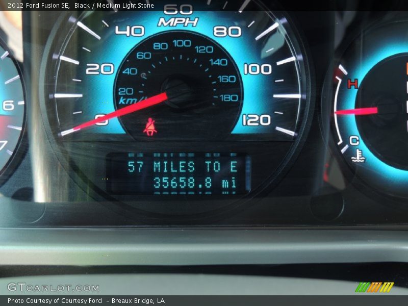 Black / Medium Light Stone 2012 Ford Fusion SE