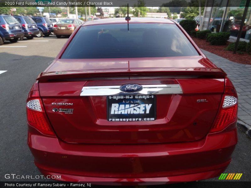Red Candy Metallic / Charcoal Black 2010 Ford Fusion SEL