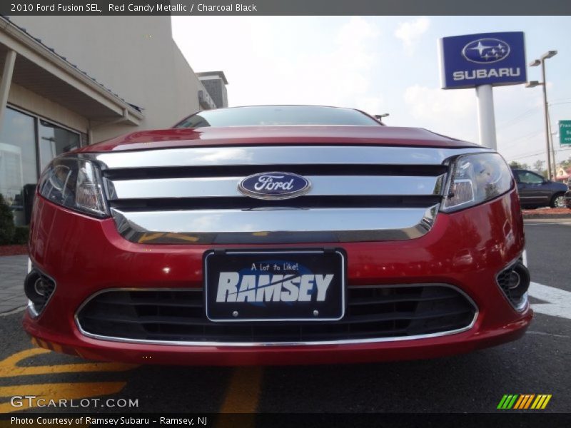 Red Candy Metallic / Charcoal Black 2010 Ford Fusion SEL