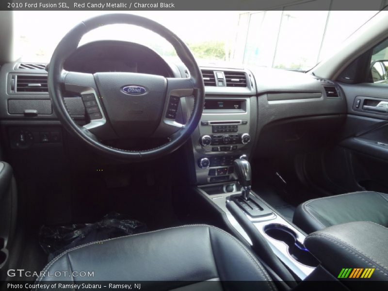 Red Candy Metallic / Charcoal Black 2010 Ford Fusion SEL