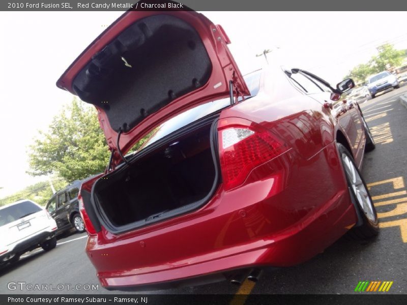 Red Candy Metallic / Charcoal Black 2010 Ford Fusion SEL