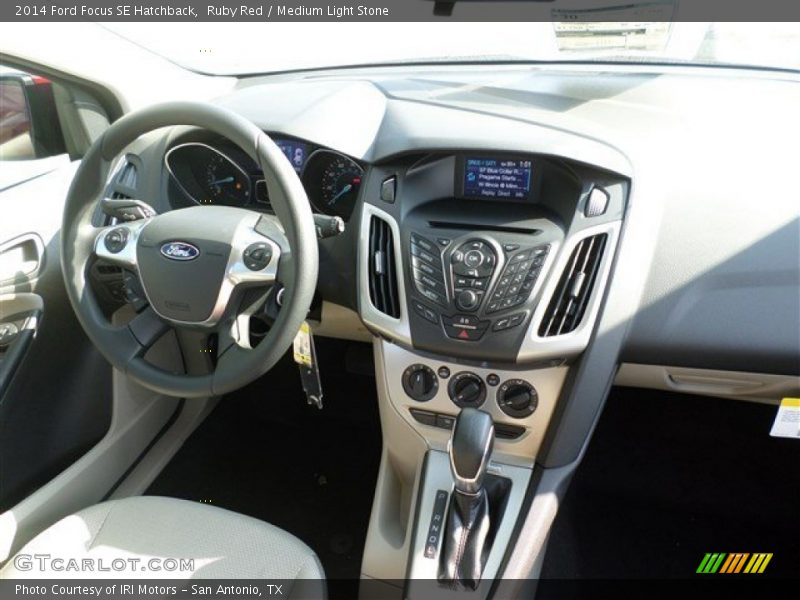 Ruby Red / Medium Light Stone 2014 Ford Focus SE Hatchback