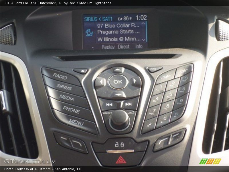 Ruby Red / Medium Light Stone 2014 Ford Focus SE Hatchback
