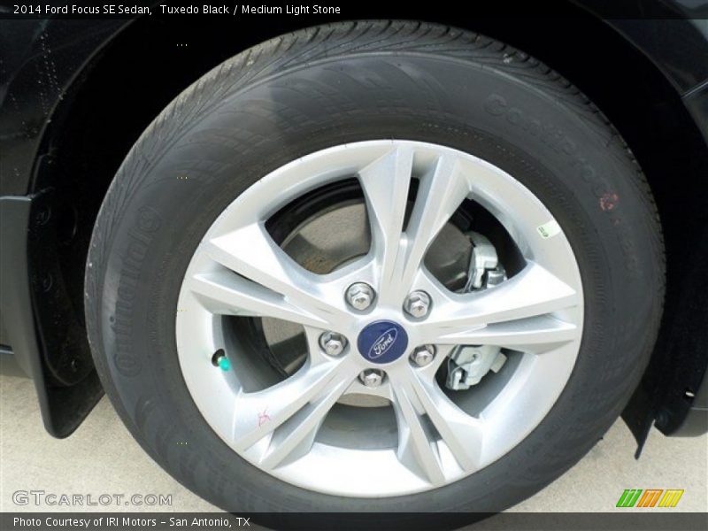 Tuxedo Black / Medium Light Stone 2014 Ford Focus SE Sedan