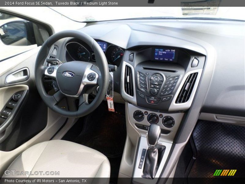 Tuxedo Black / Medium Light Stone 2014 Ford Focus SE Sedan