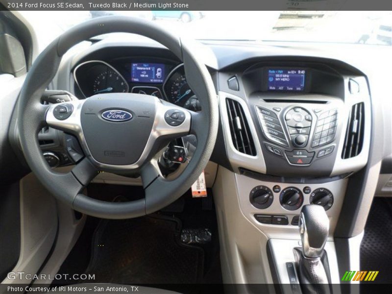Tuxedo Black / Medium Light Stone 2014 Ford Focus SE Sedan