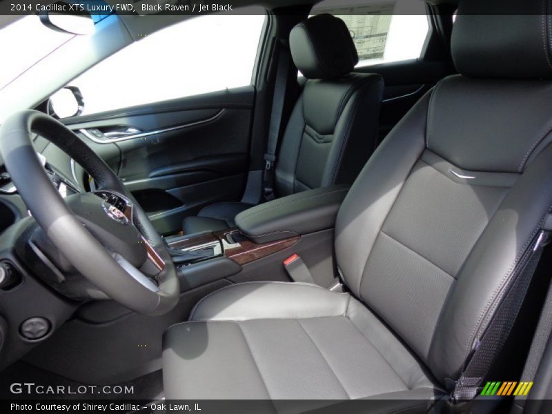 Front Seat of 2014 XTS Luxury FWD