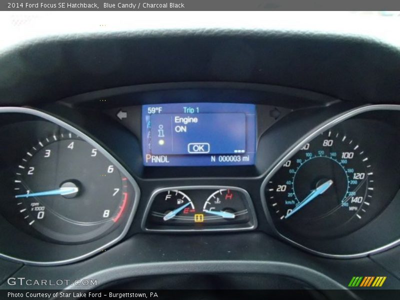 Blue Candy / Charcoal Black 2014 Ford Focus SE Hatchback