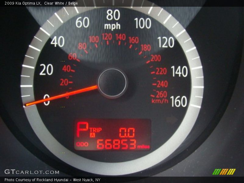 Clear White / Beige 2009 Kia Optima LX