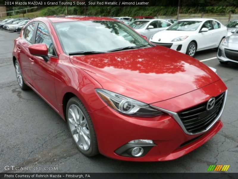 Front 3/4 View of 2014 MAZDA3 s Grand Touring 5 Door