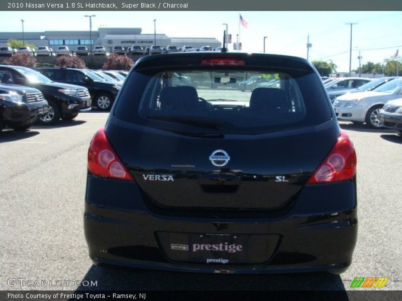 Super Black / Charcoal 2010 Nissan Versa 1.8 SL Hatchback