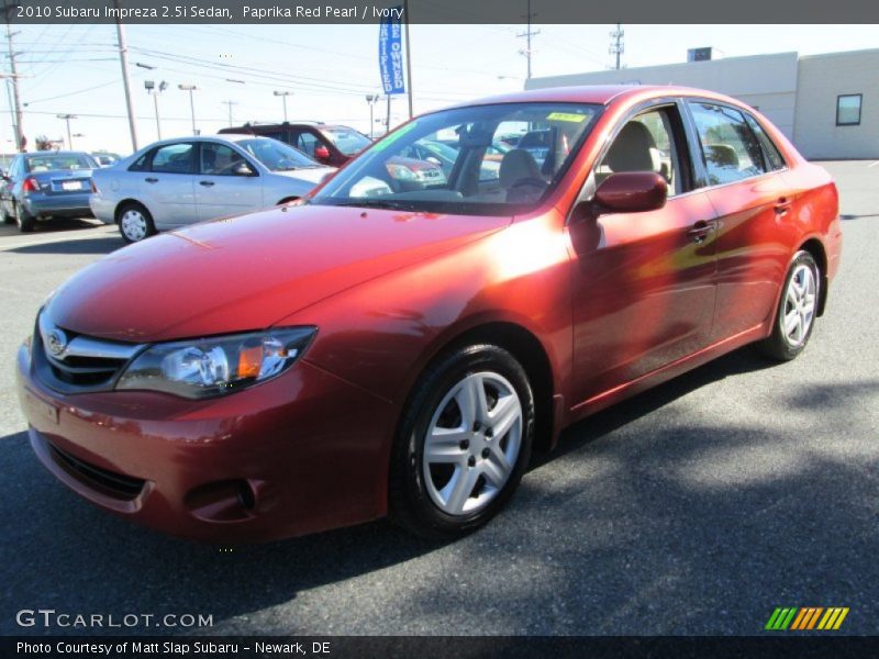 Paprika Red Pearl / Ivory 2010 Subaru Impreza 2.5i Sedan