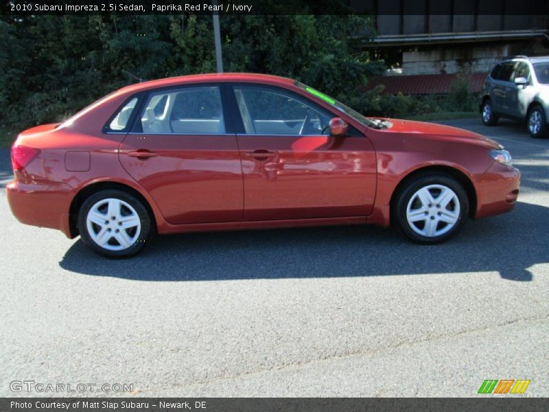 Paprika Red Pearl / Ivory 2010 Subaru Impreza 2.5i Sedan