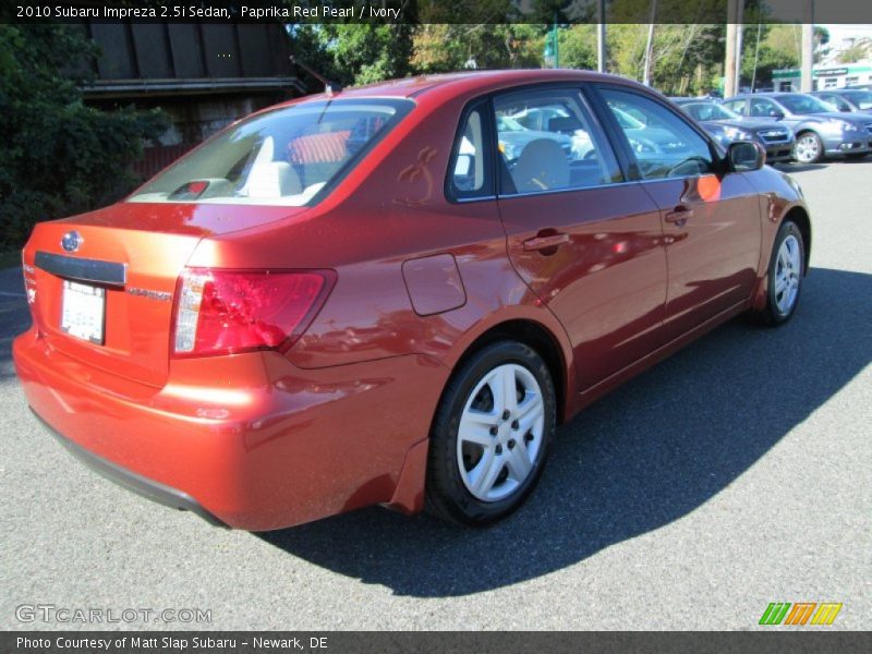 Paprika Red Pearl / Ivory 2010 Subaru Impreza 2.5i Sedan
