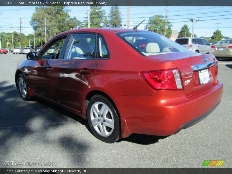 Paprika Red Pearl / Ivory 2010 Subaru Impreza 2.5i Sedan