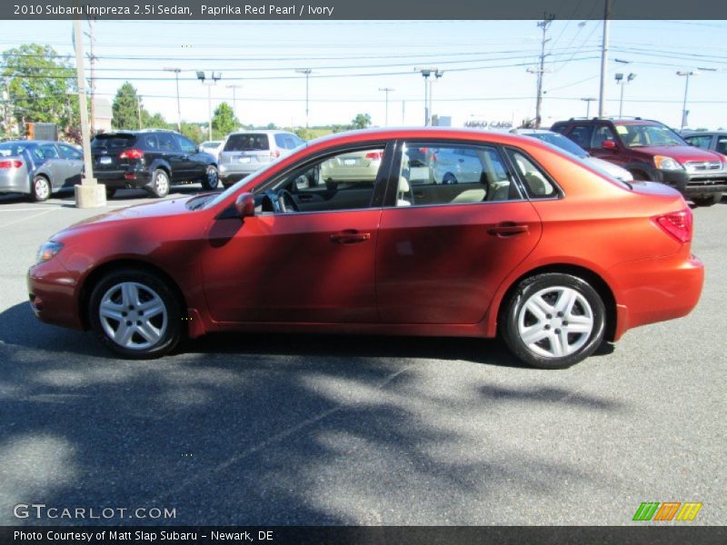 Paprika Red Pearl / Ivory 2010 Subaru Impreza 2.5i Sedan