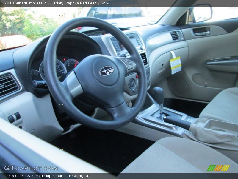 Paprika Red Pearl / Ivory 2010 Subaru Impreza 2.5i Sedan