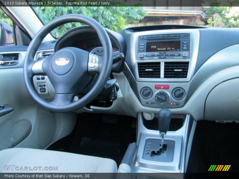 Paprika Red Pearl / Ivory 2010 Subaru Impreza 2.5i Sedan