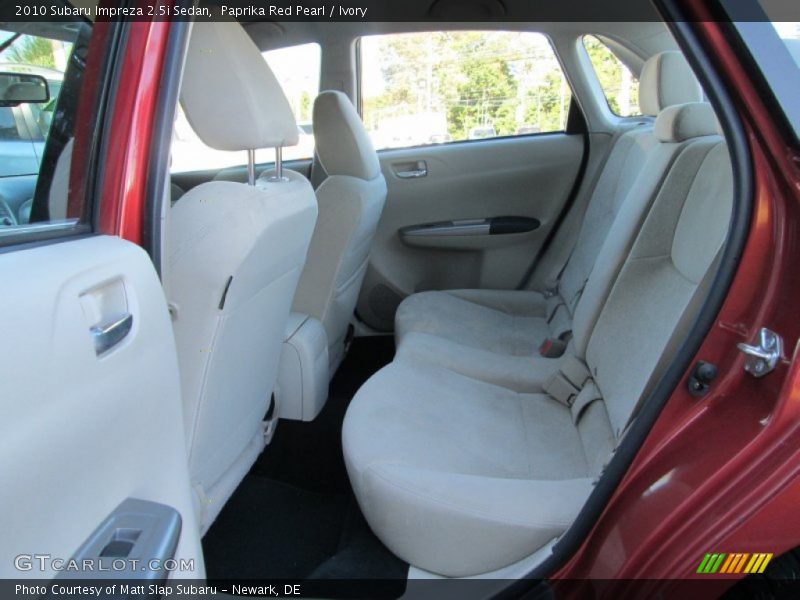 Paprika Red Pearl / Ivory 2010 Subaru Impreza 2.5i Sedan