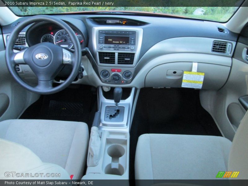Paprika Red Pearl / Ivory 2010 Subaru Impreza 2.5i Sedan
