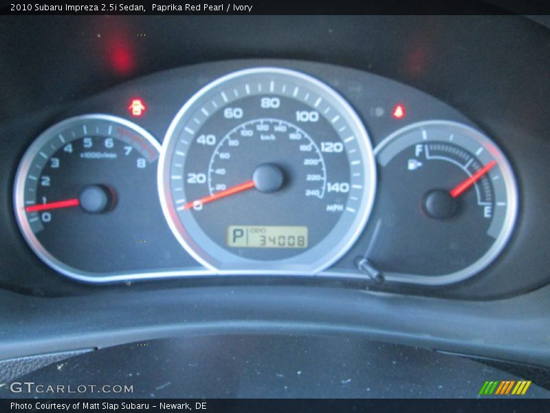 Paprika Red Pearl / Ivory 2010 Subaru Impreza 2.5i Sedan