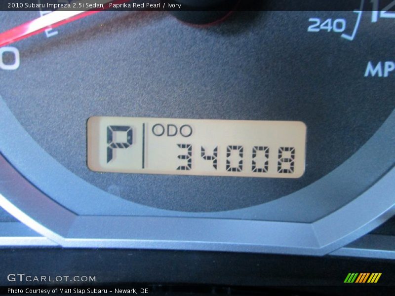 Paprika Red Pearl / Ivory 2010 Subaru Impreza 2.5i Sedan