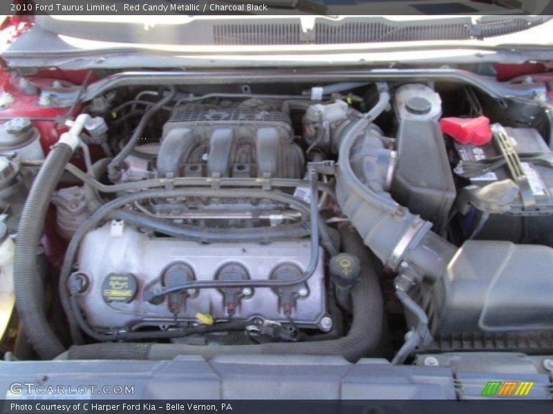 Red Candy Metallic / Charcoal Black 2010 Ford Taurus Limited