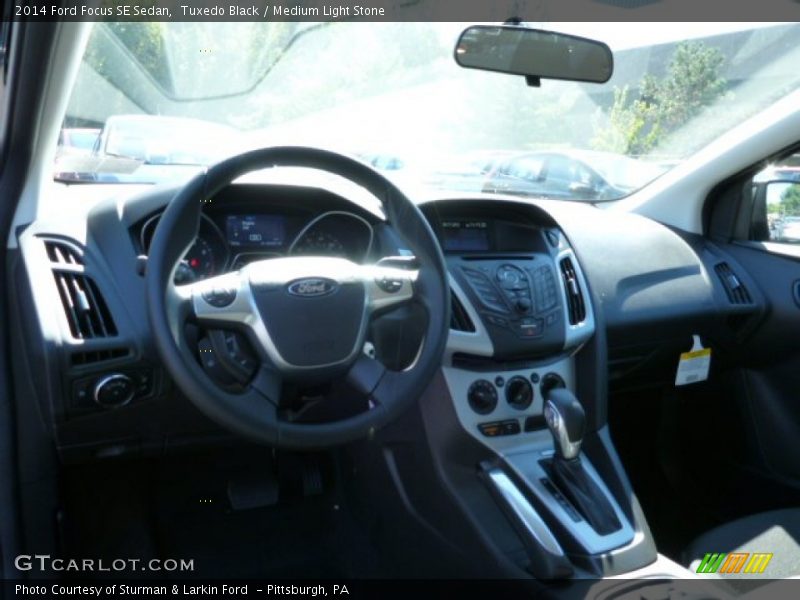 Tuxedo Black / Medium Light Stone 2014 Ford Focus SE Sedan