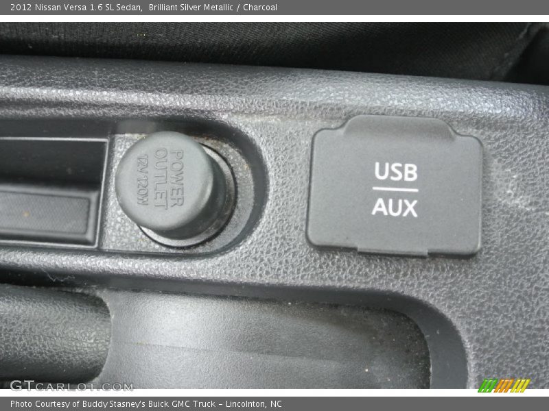Brilliant Silver Metallic / Charcoal 2012 Nissan Versa 1.6 SL Sedan