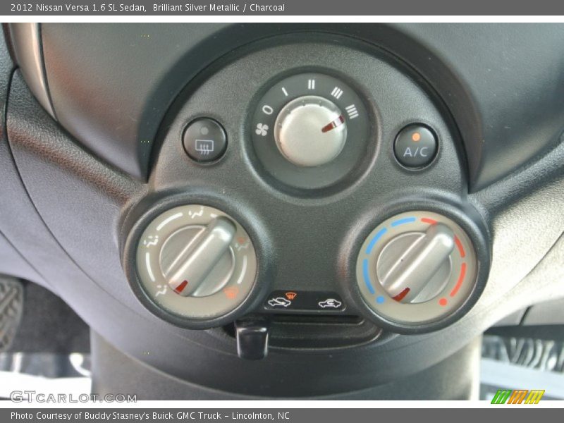 Brilliant Silver Metallic / Charcoal 2012 Nissan Versa 1.6 SL Sedan