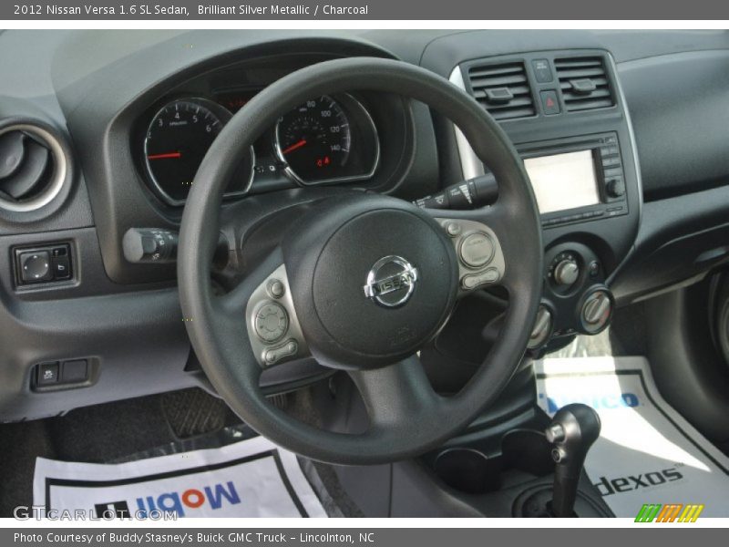Brilliant Silver Metallic / Charcoal 2012 Nissan Versa 1.6 SL Sedan