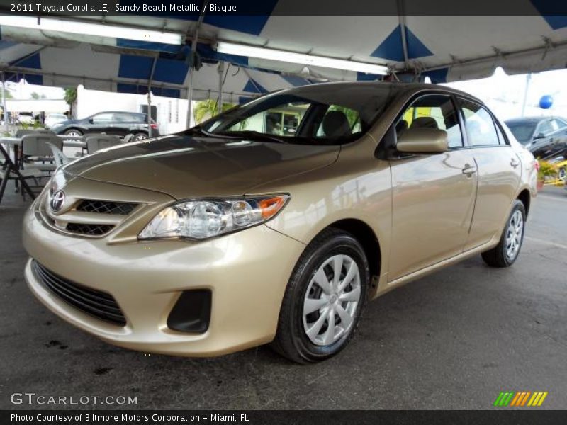 Sandy Beach Metallic / Bisque 2011 Toyota Corolla LE