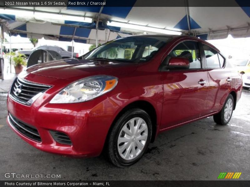 Red Brick / Charcoal 2012 Nissan Versa 1.6 SV Sedan