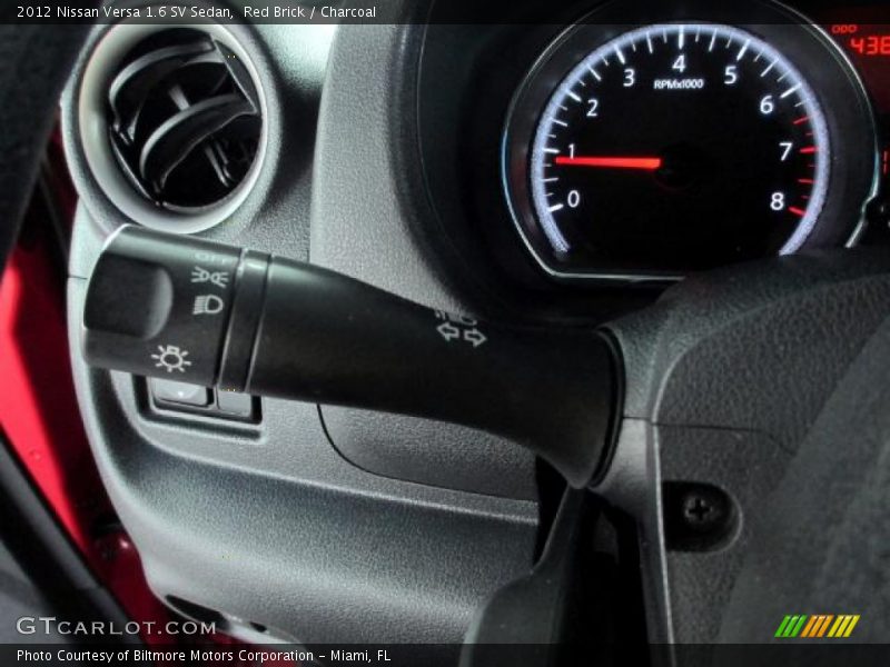 Red Brick / Charcoal 2012 Nissan Versa 1.6 SV Sedan