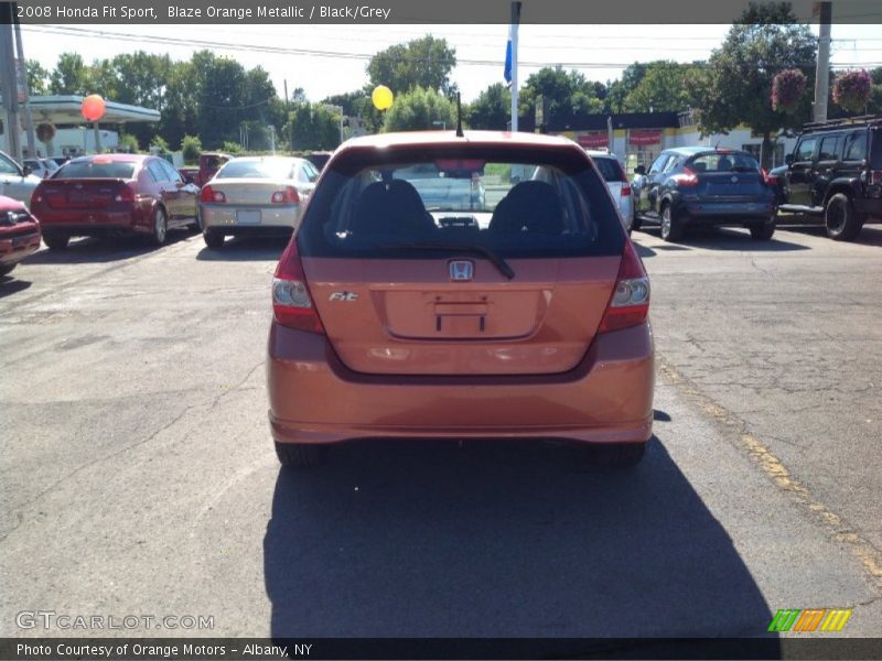 Blaze Orange Metallic / Black/Grey 2008 Honda Fit Sport