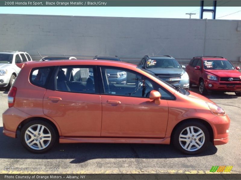 Blaze Orange Metallic / Black/Grey 2008 Honda Fit Sport