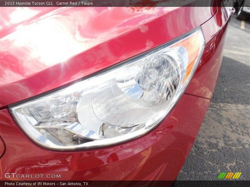 Garnet Red / Taupe 2013 Hyundai Tucson GLS