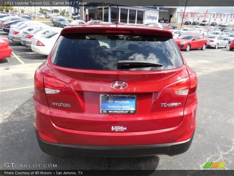 Garnet Red / Taupe 2013 Hyundai Tucson GLS