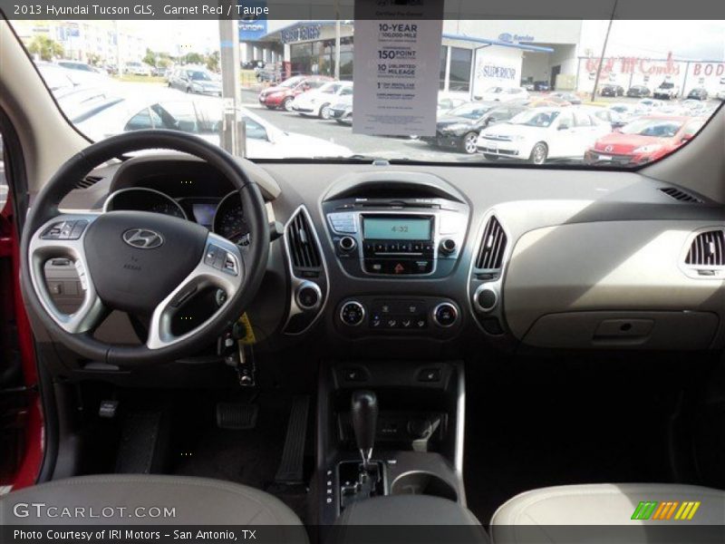 Garnet Red / Taupe 2013 Hyundai Tucson GLS