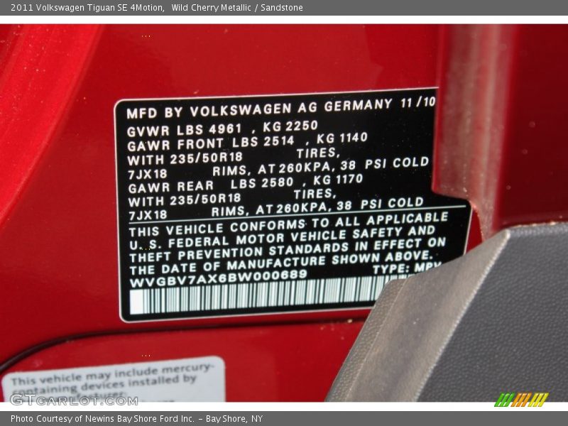 Wild Cherry Metallic / Sandstone 2011 Volkswagen Tiguan SE 4Motion