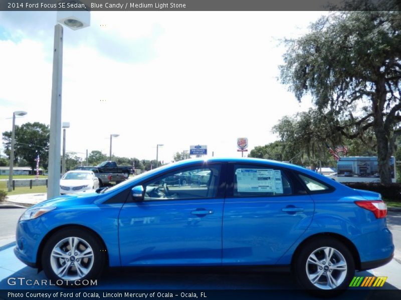 Blue Candy / Medium Light Stone 2014 Ford Focus SE Sedan