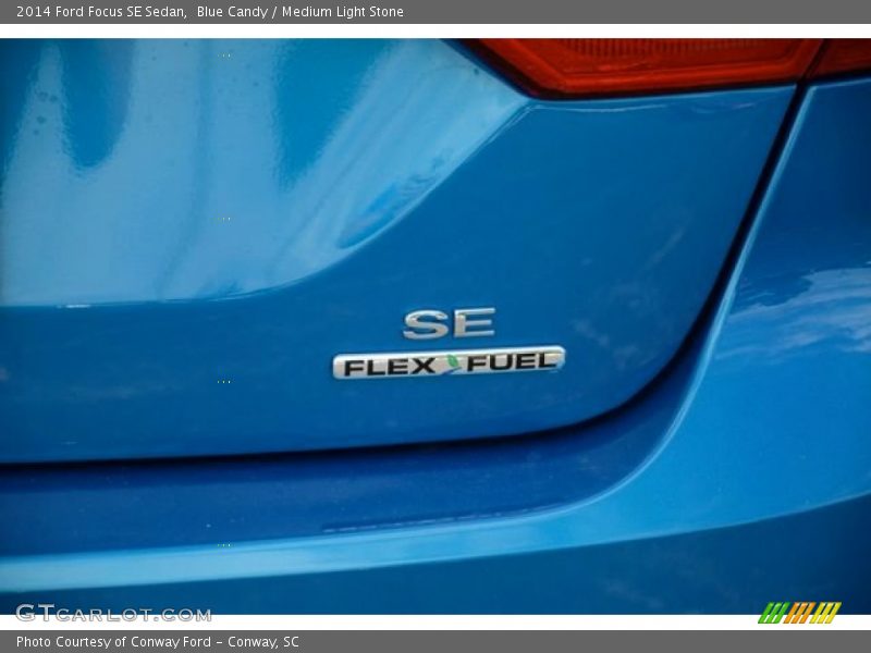 Blue Candy / Medium Light Stone 2014 Ford Focus SE Sedan