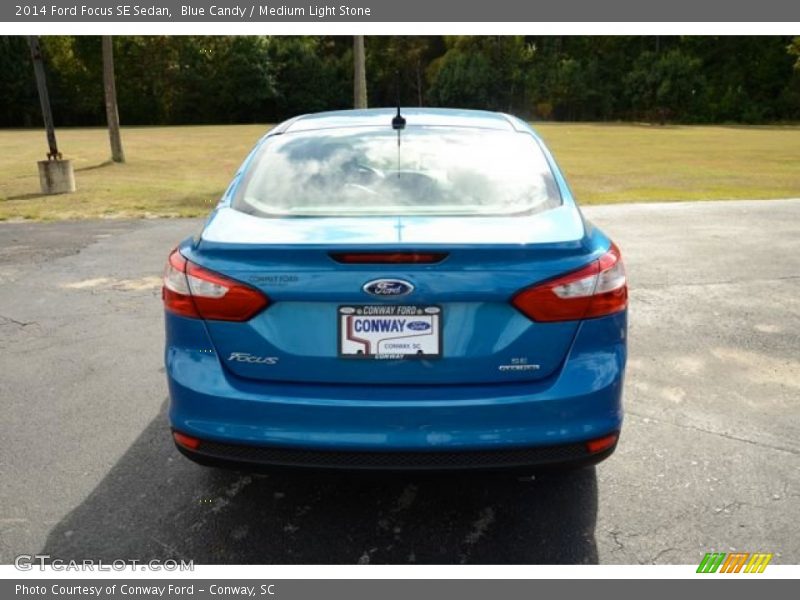 Blue Candy / Medium Light Stone 2014 Ford Focus SE Sedan